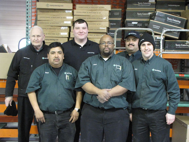 Group of delivery drivers posing for a picture