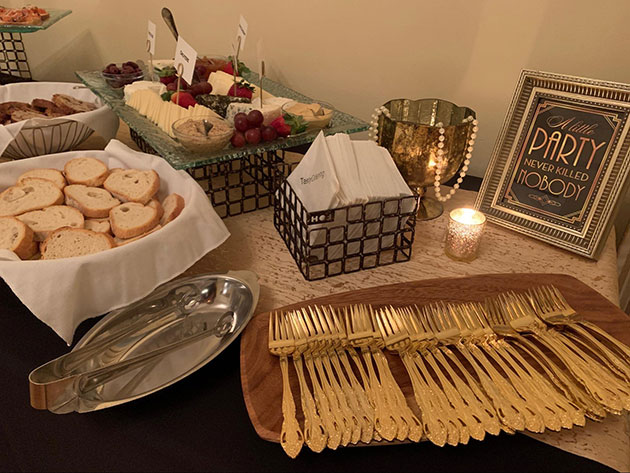 Golden forks on an appetizer table