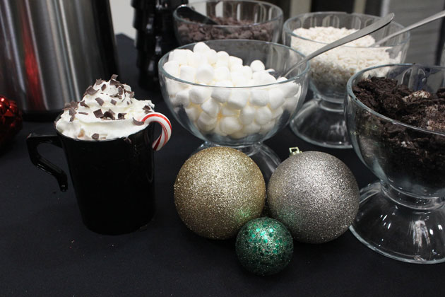 Hot chocolate bar with crushed oreo cookies, marshmallows, chocolate chips and more
