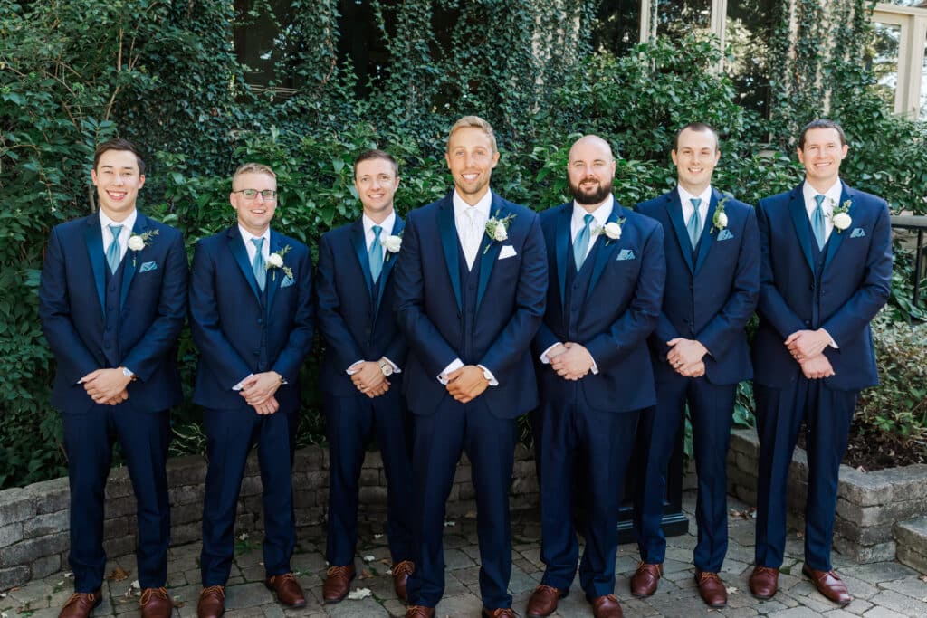 groom and groomsmen posing