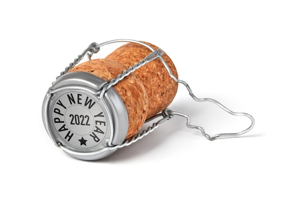 Champagne bottle top with 'Happy New Year 2022' written on it