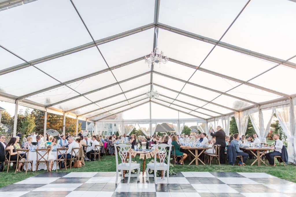 tented wedding with checkered dance floor